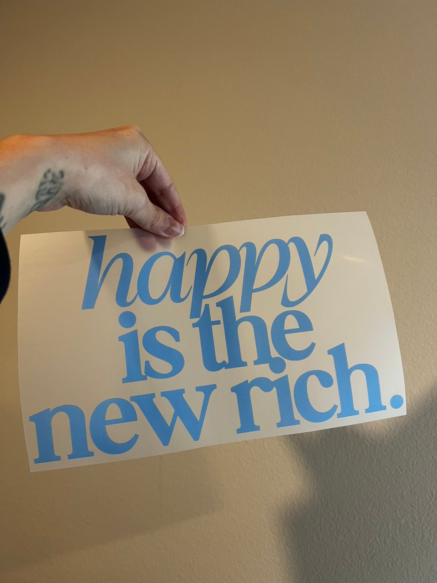 happy is the new rich