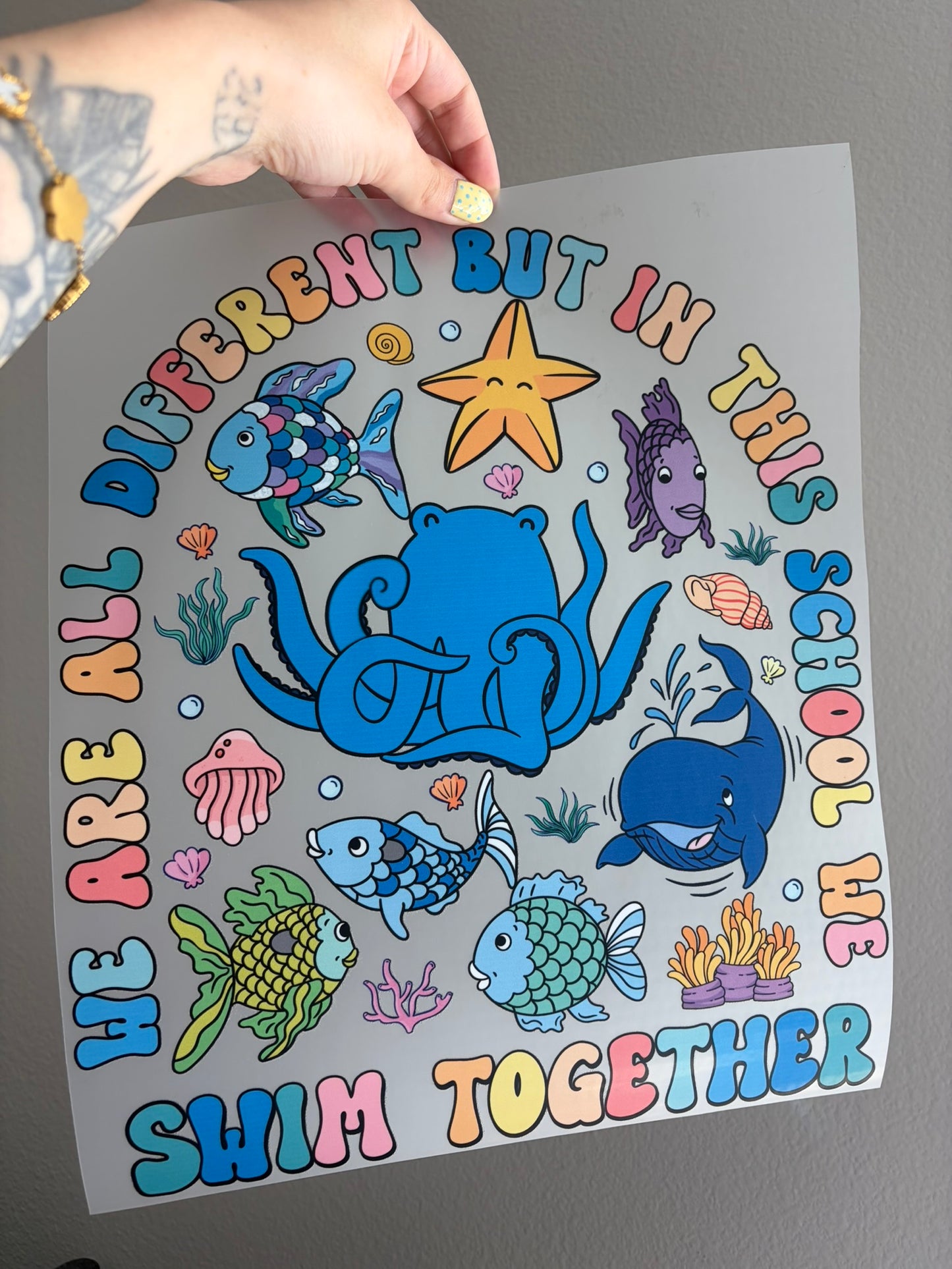 we are all different, but in the school we swim together